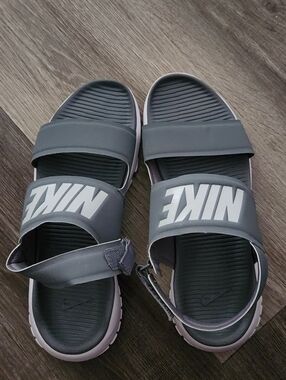 Nike woman's Gray and White Slide Sandals